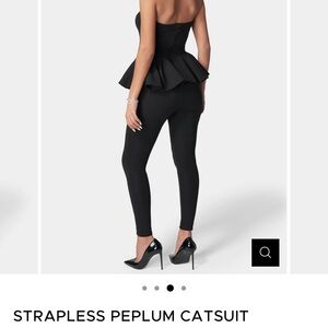 bebe Black Strapless Peplum Catsuit